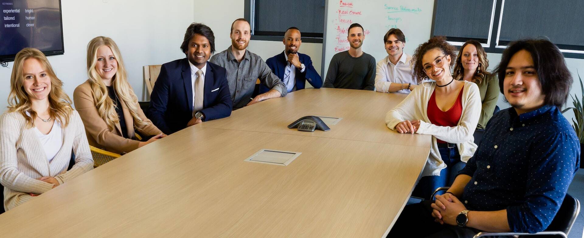 a diverse group of people in a meeting