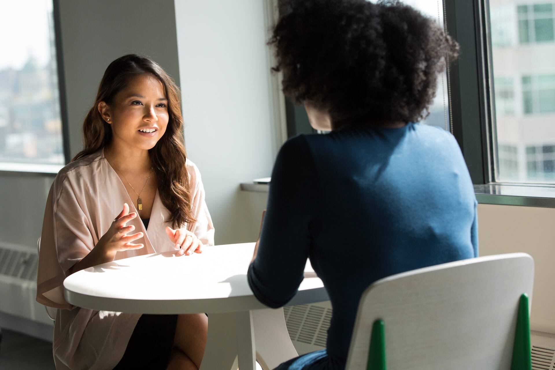 two women in a meeting