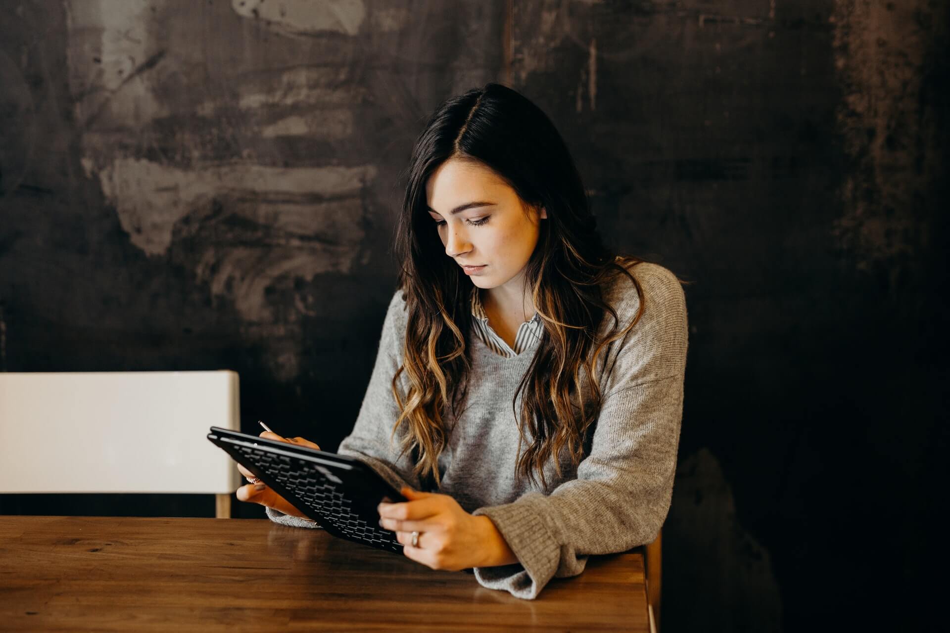 Woman looking information in a tablet