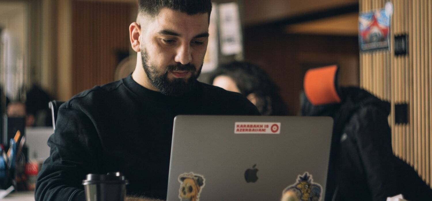 Man working in a macbook