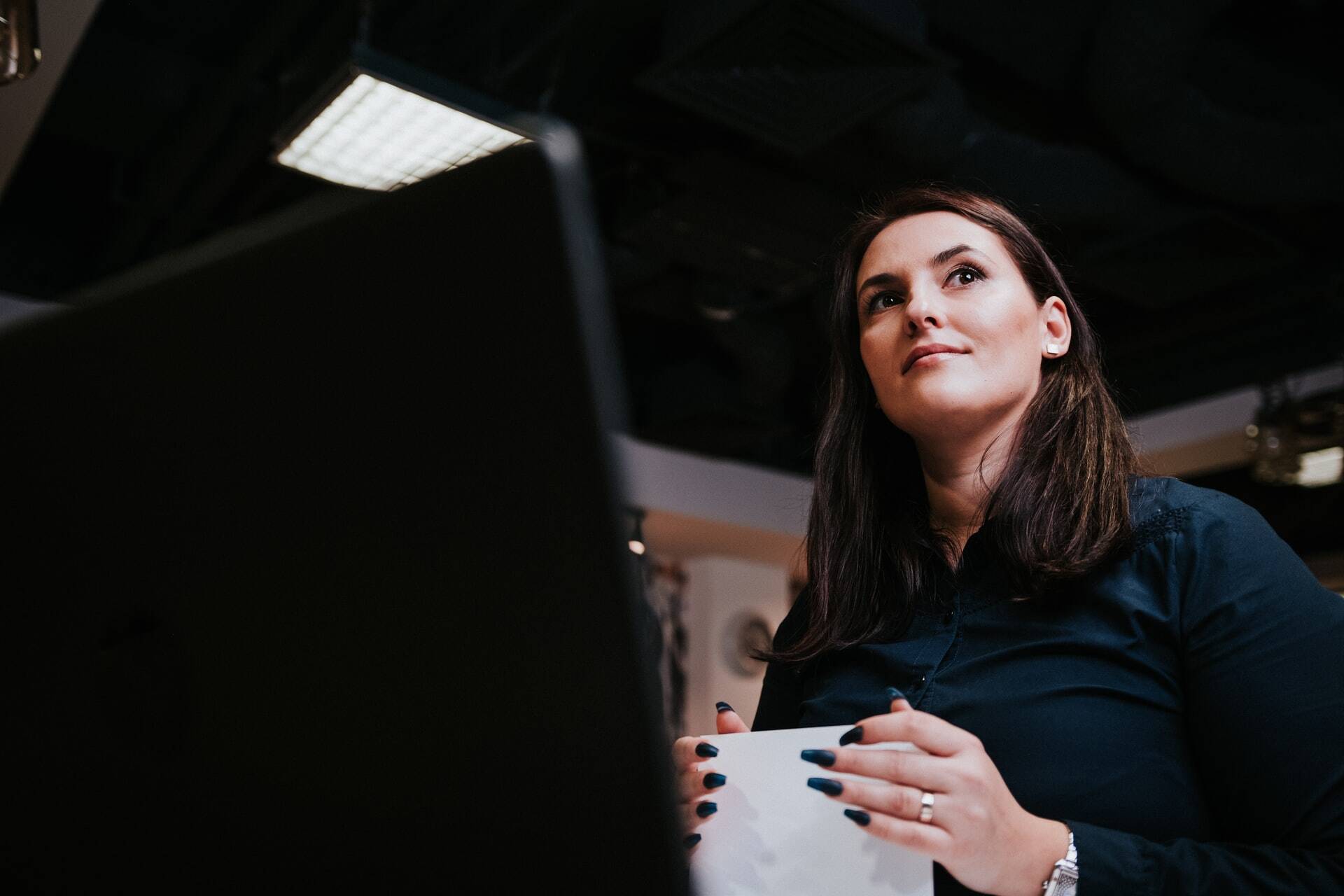 Woman thinking at work