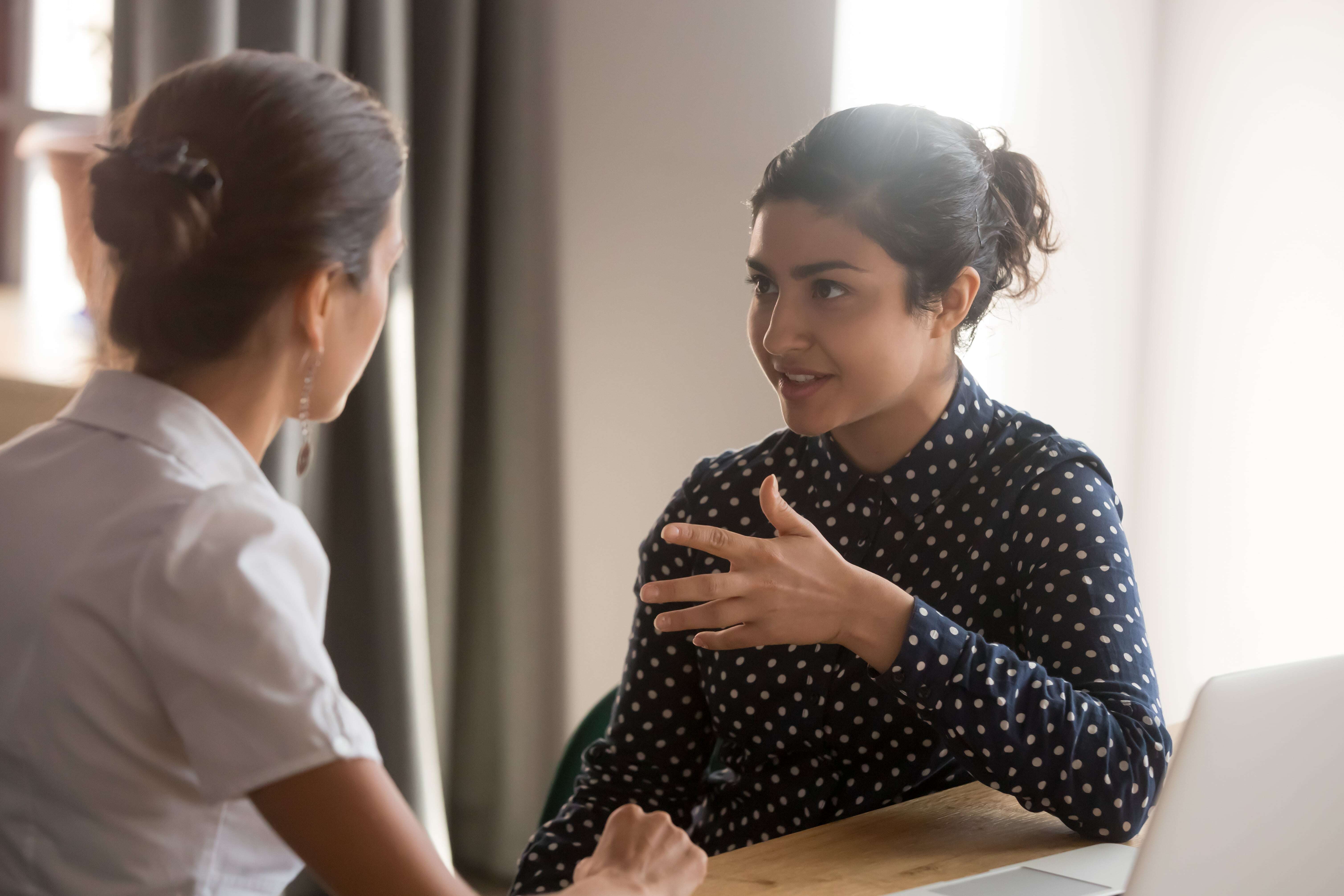 Two women talking