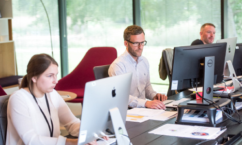 Two people working in a office