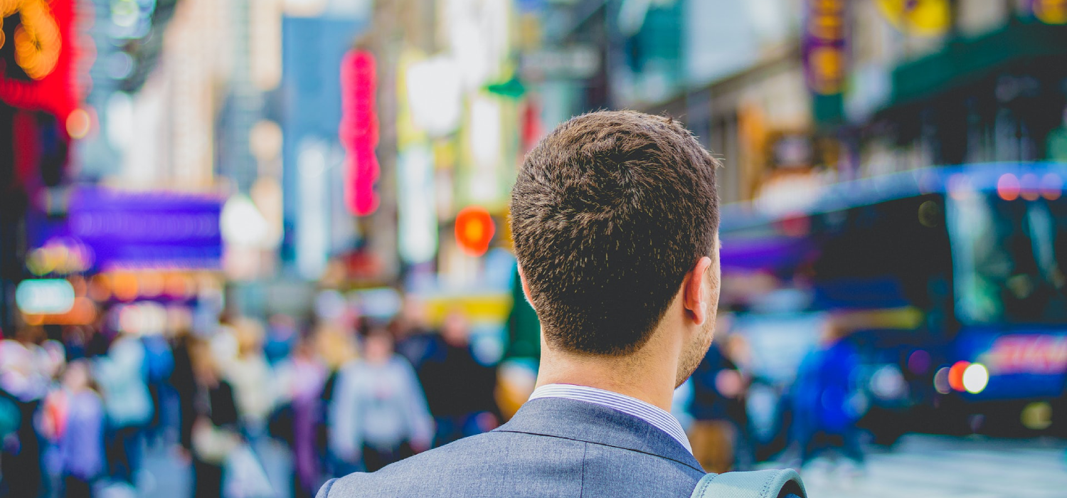 Man walking in a crowded area