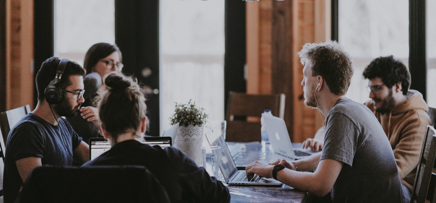 Three people in a meeting