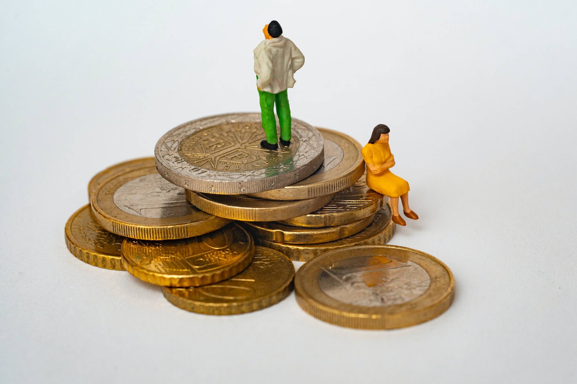 Two people sitting in coins