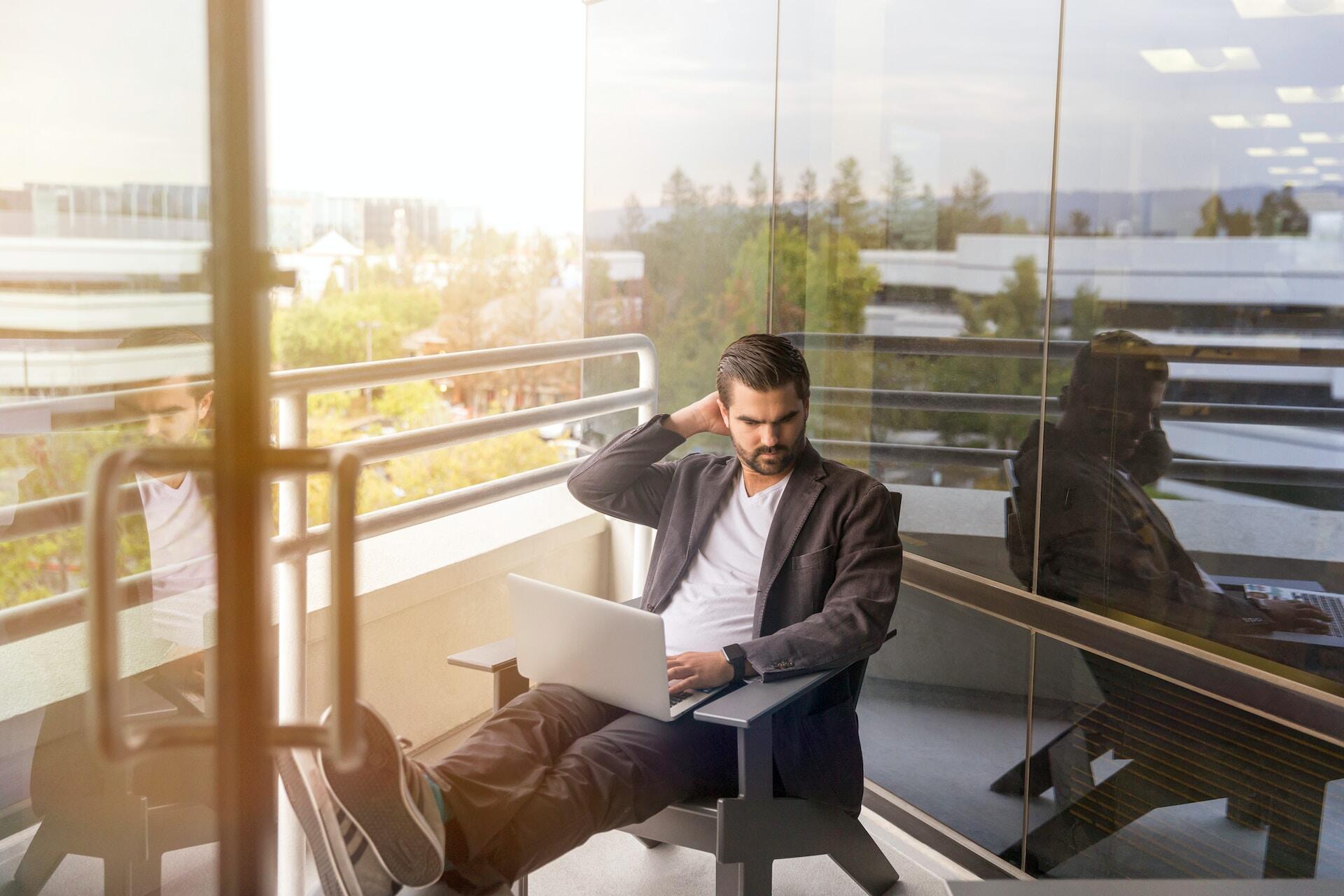 man working in a notebook outdoor