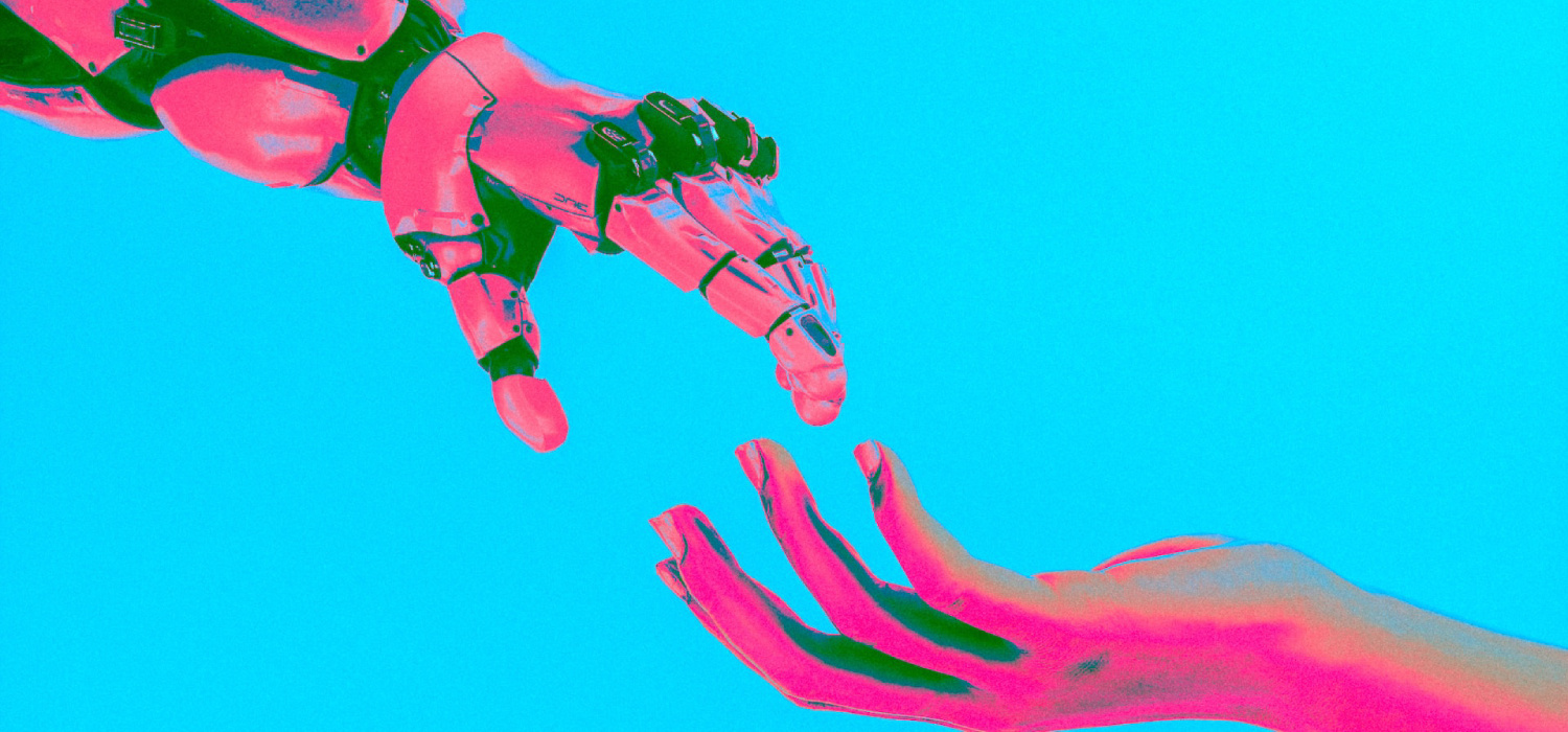 A robot hand reaching a human hand