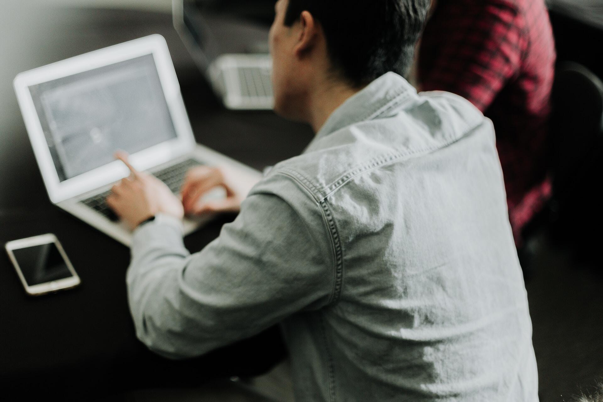 man working in a computer