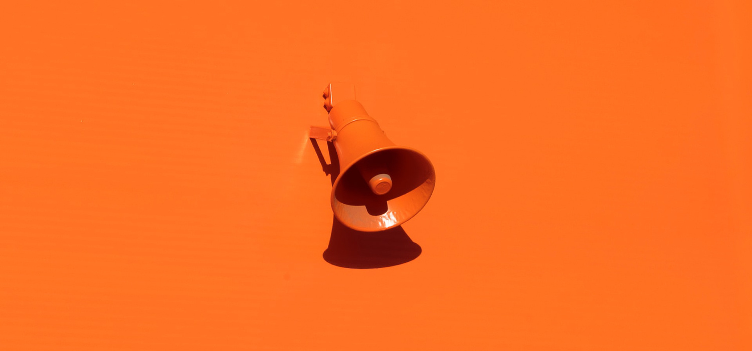 Orange speaker in a orange wall